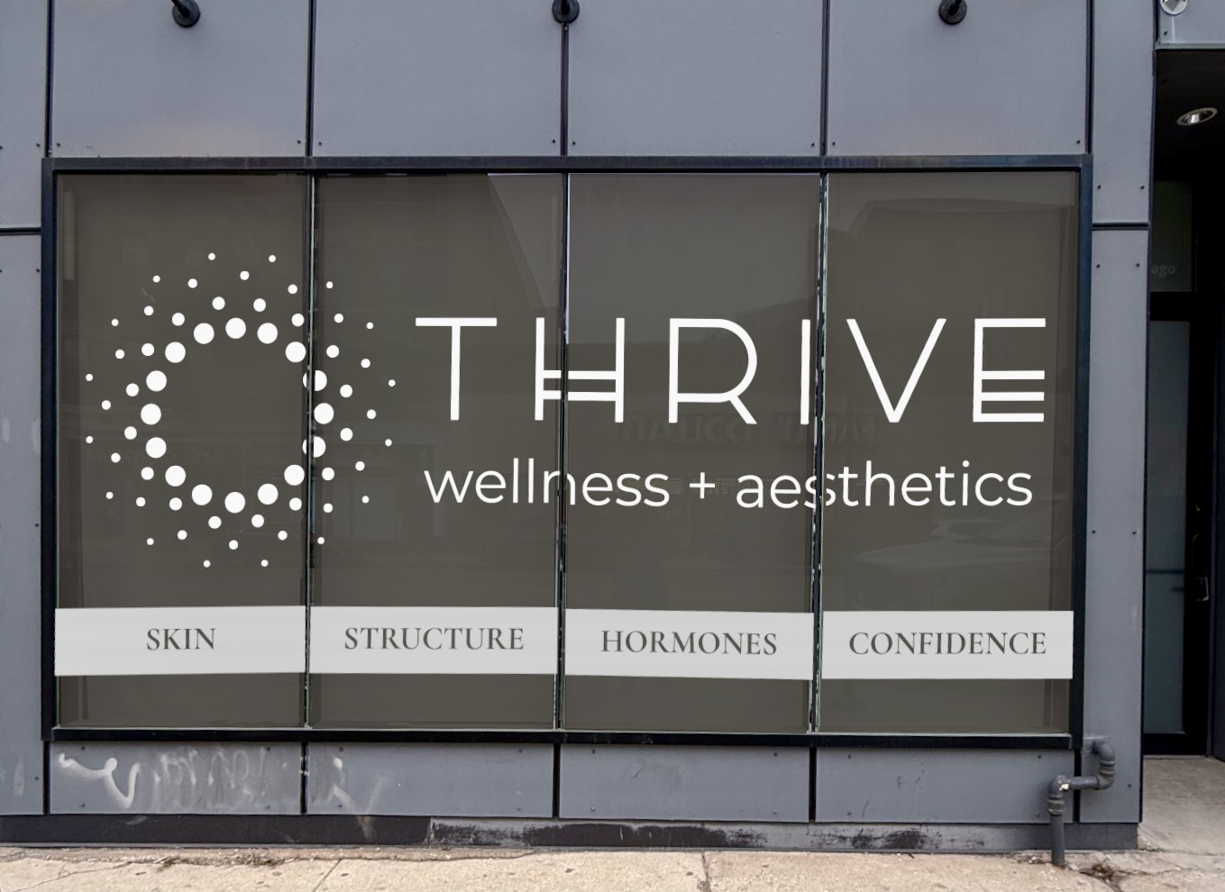 Professional storefront window graphics with vinyl lettering